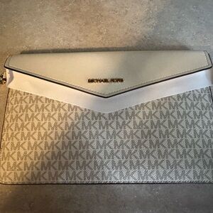 Brand new Michael Kors envelope wristlet